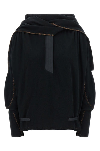 the kiko kostadinov petrel sweater redefines the volumes of contemporary knitw