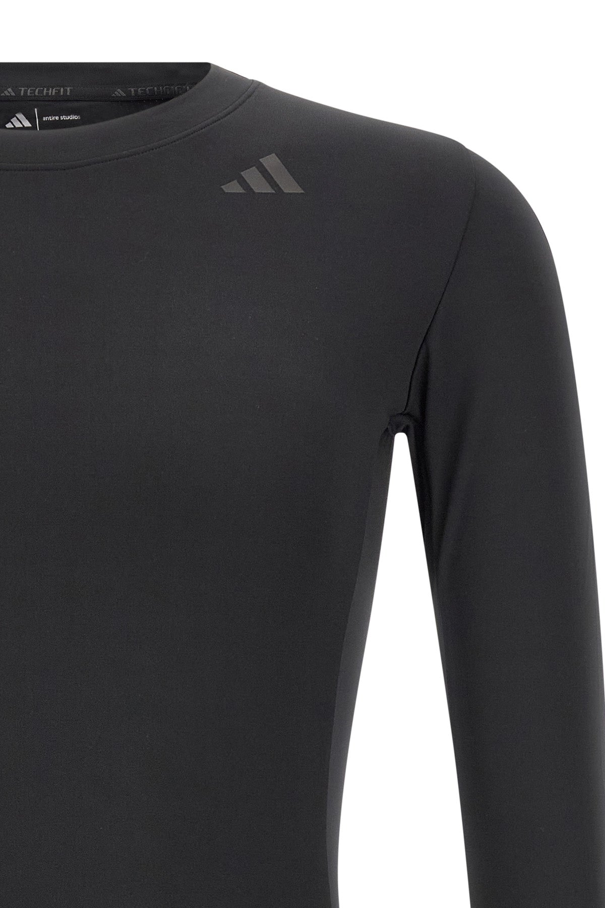 the statement x entire studios adidas long-sleeved training t-shirt features a t