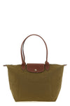 the longchamp le pliage original l shoulder bag is distinguished by a capaciou