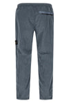 3100035 joggers in stone island nylon metal fabric subjected to a double wrink
