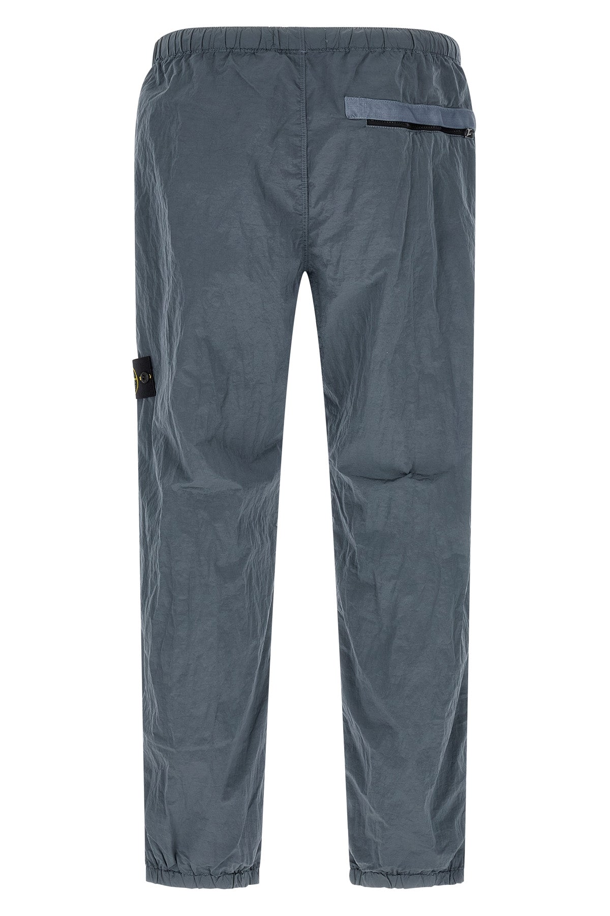 3100035 joggers in stone island nylon metal fabric subjected to a double wrink