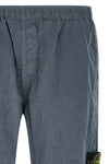 3100035 joggers in stone island nylon metal fabric subjected to a double wrink