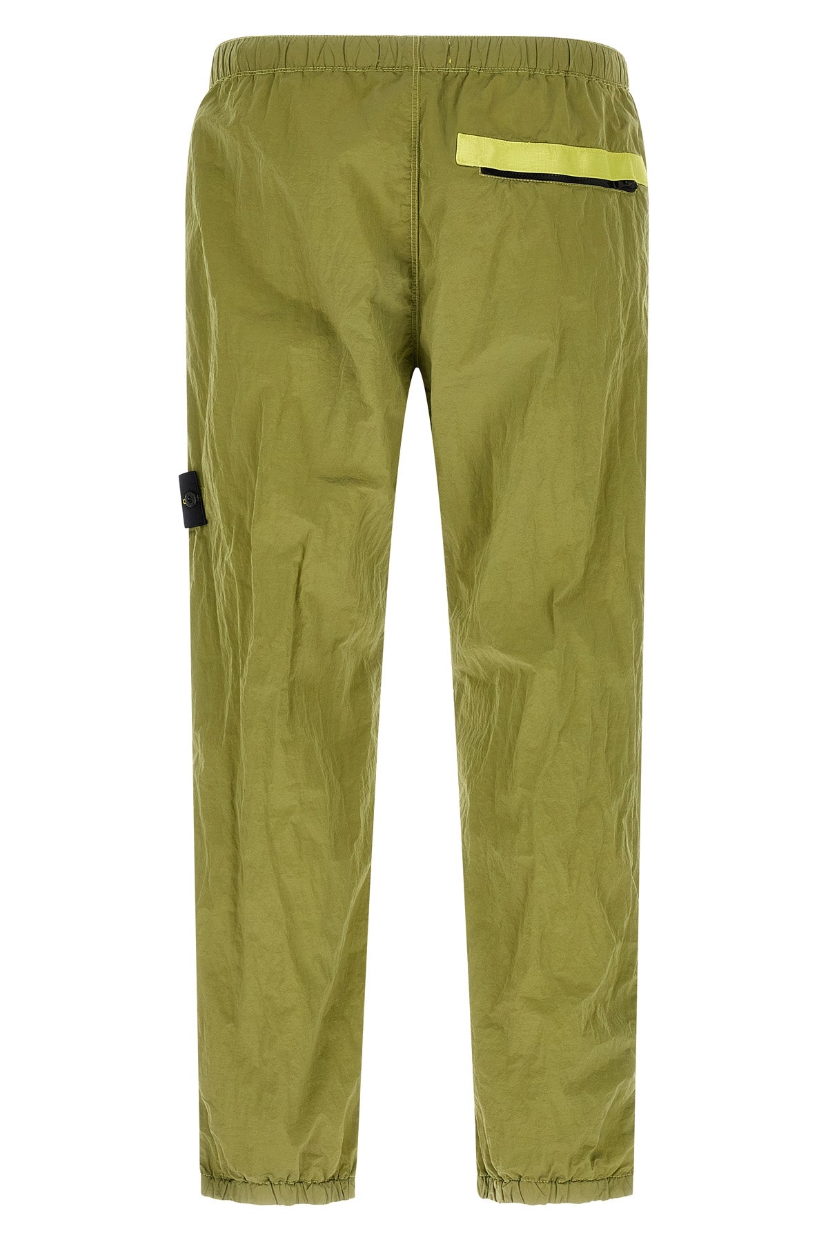 3100035 joggers in stone island nylon metal fabric subjected to a double wrink