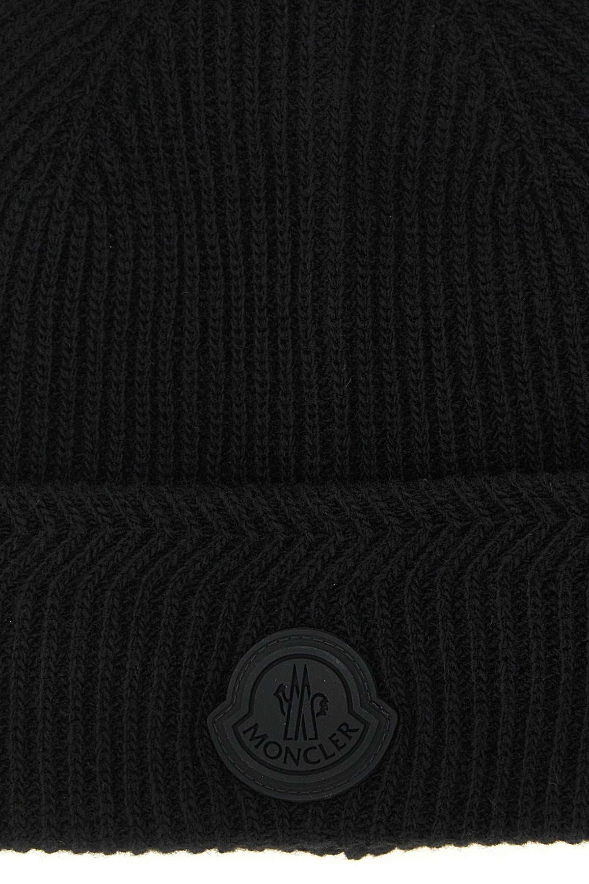the moncler cap defines the winter wardrobe through precise technical constructi