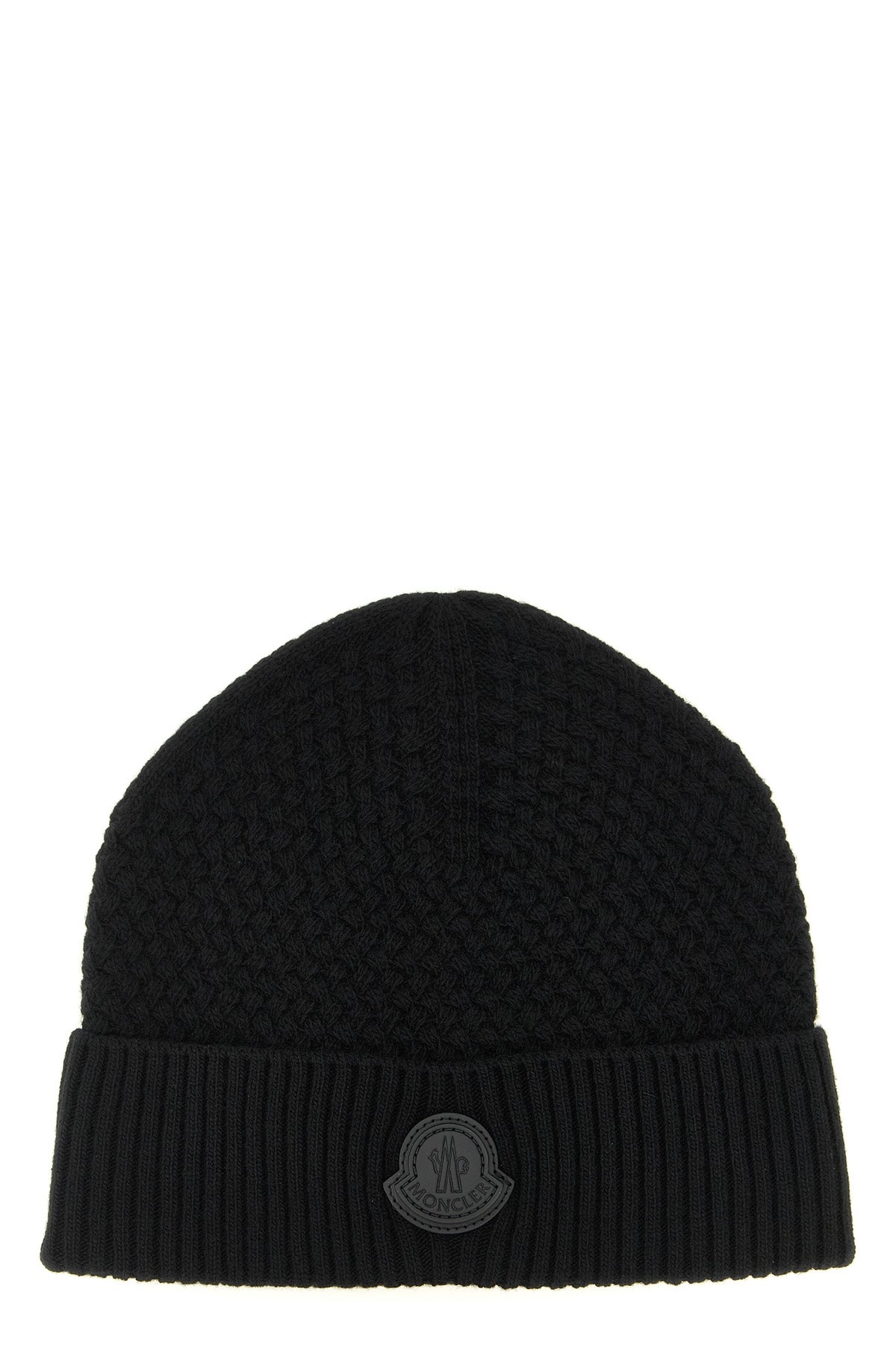 the moncler cap presents a sophisticated approach to winter accessories through