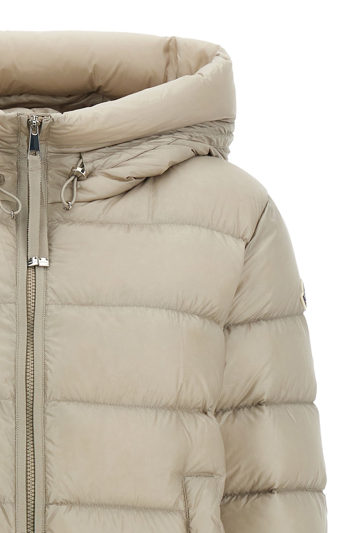 the moncler suyen midi down jacket redefines the codes of outerwear through a