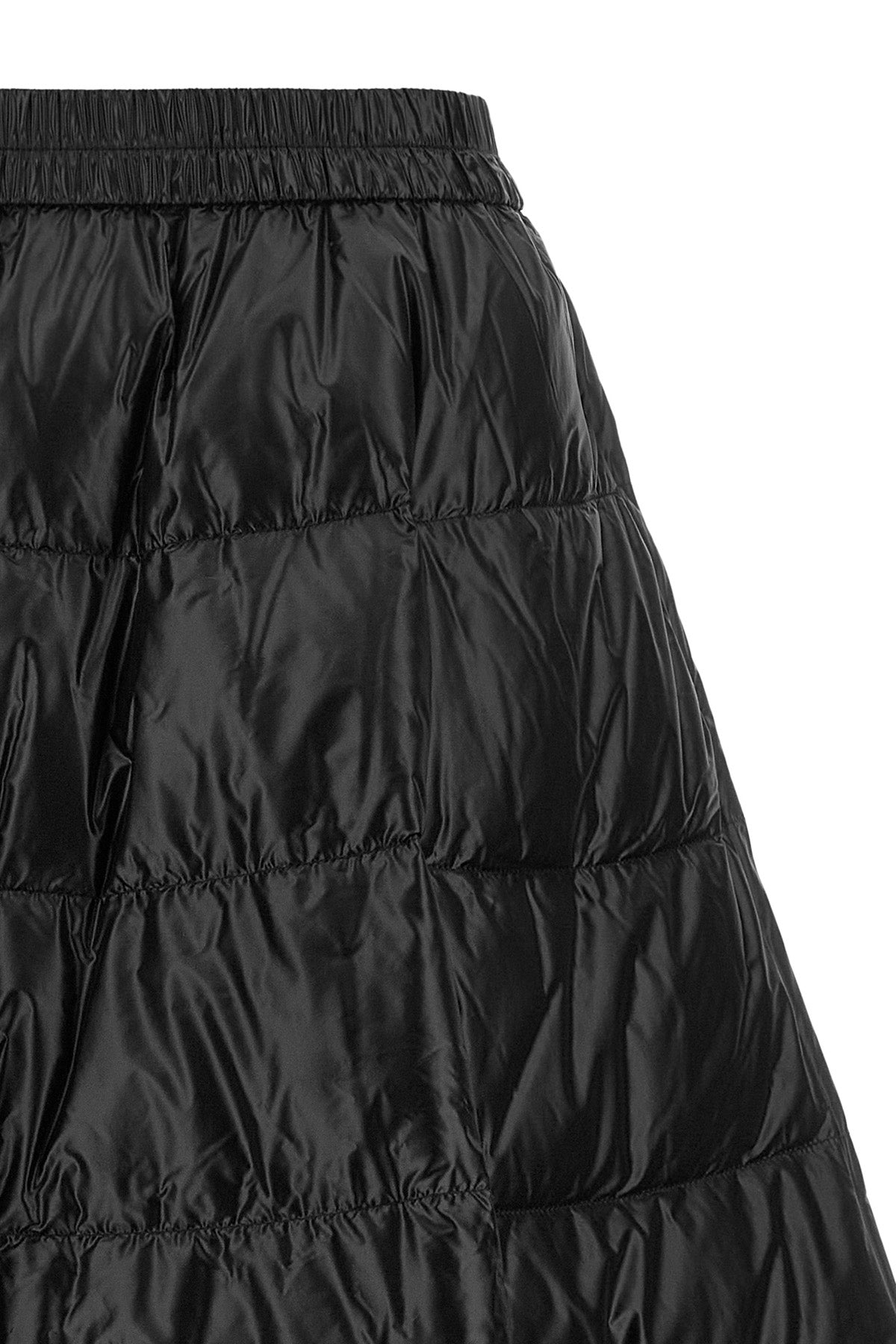 the moncler midi skirt defines a flared silhouette through a rigorous sartorial