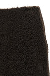 the moncler mini skirt redefines the codes of après-ski clothing through a flare
