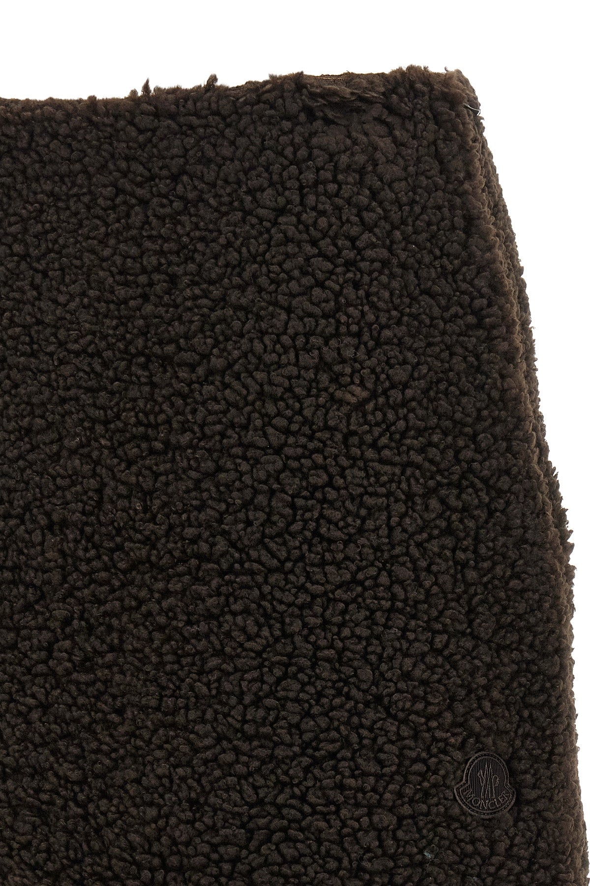 the moncler mini skirt redefines the codes of après-ski clothing through a flare
