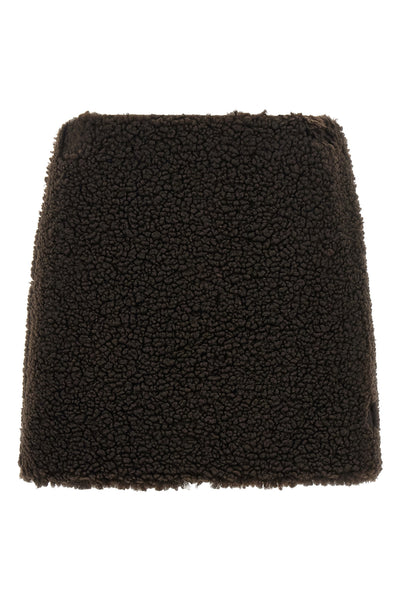 the moncler mini skirt redefines the codes of après-ski clothing through a flare