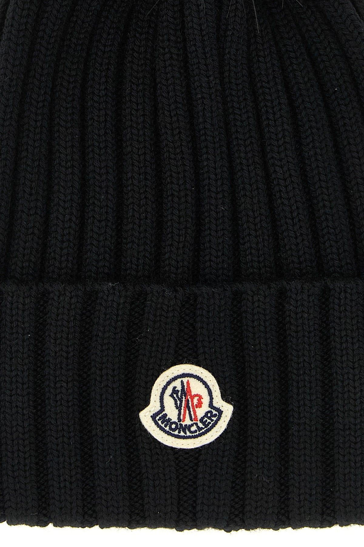 the moncler pure virgin wool beanie represents a perfect synthesis between therm