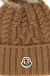 the moncler cap is structured through a complex braid process that enhances the