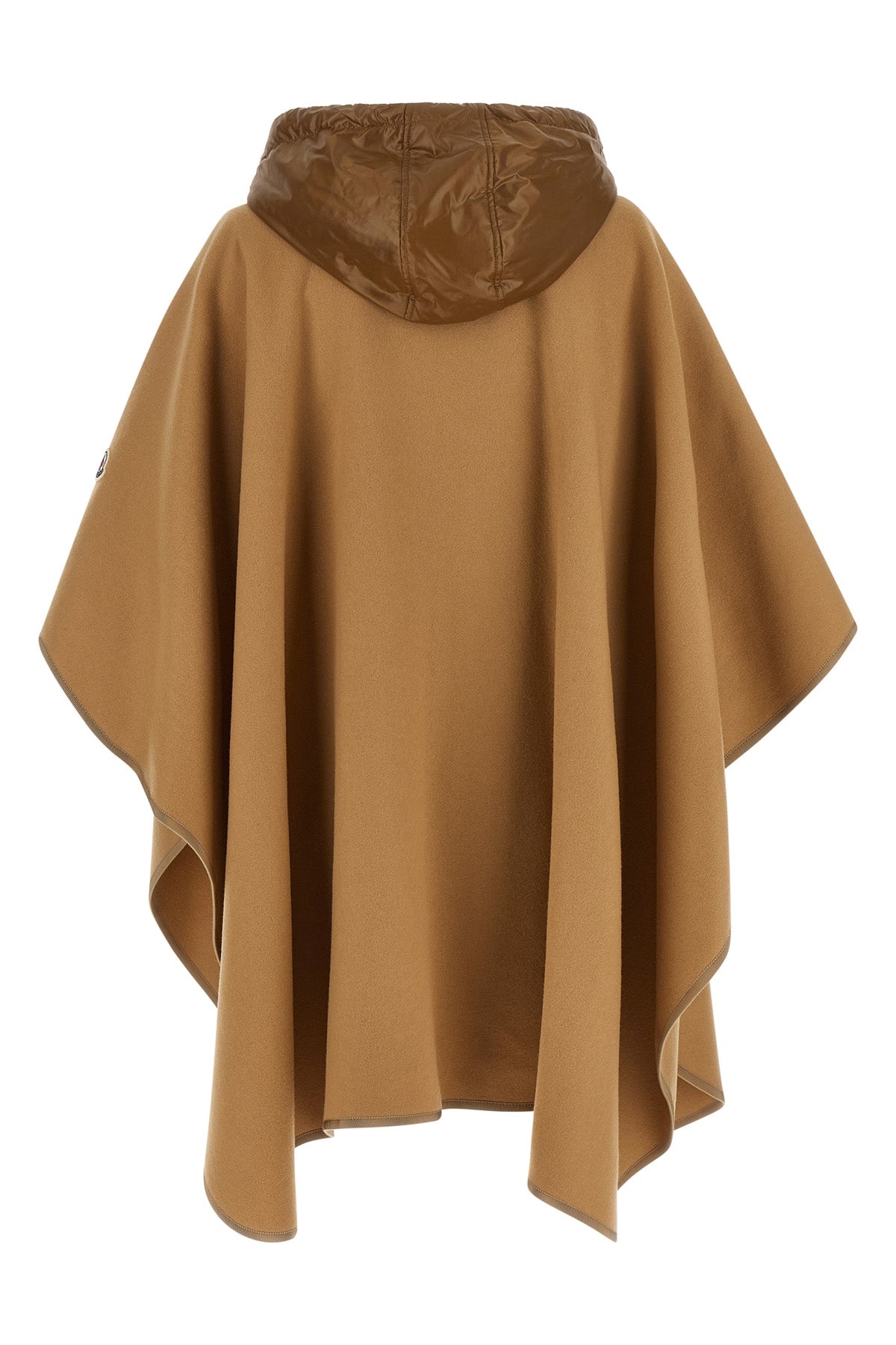 the moncler virgin wool blend cape is distinguished by a draped silhouette and m