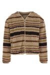 the moncler cardigan stands out for its structured construction in wool blend