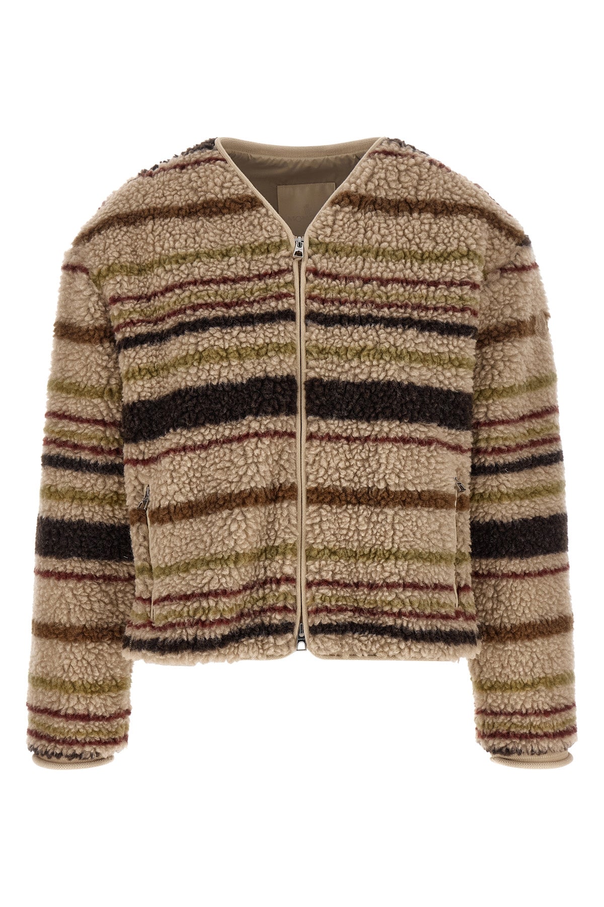 the moncler cardigan stands out for its structured construction in wool blend