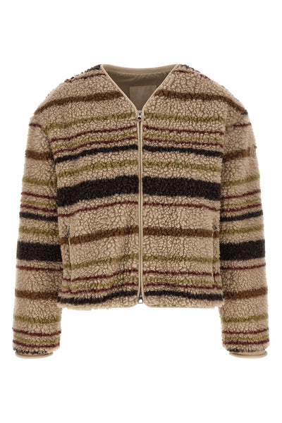 the moncler cardigan stands out for its structured construction in wool blend