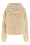 the moncler sweatshirt stands out for its hybrid construction that combines knit