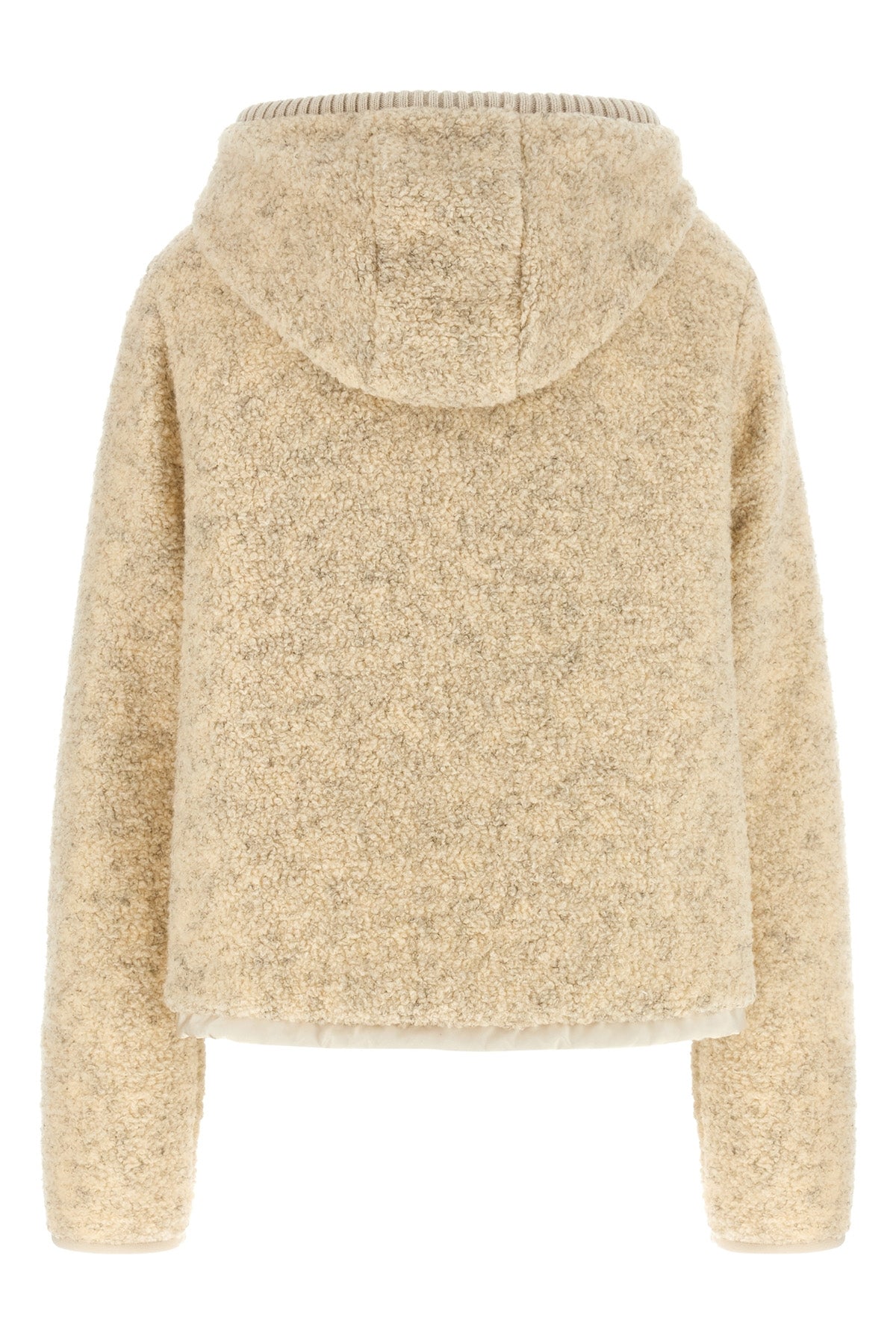 the moncler sweatshirt stands out for its hybrid construction that combines knit