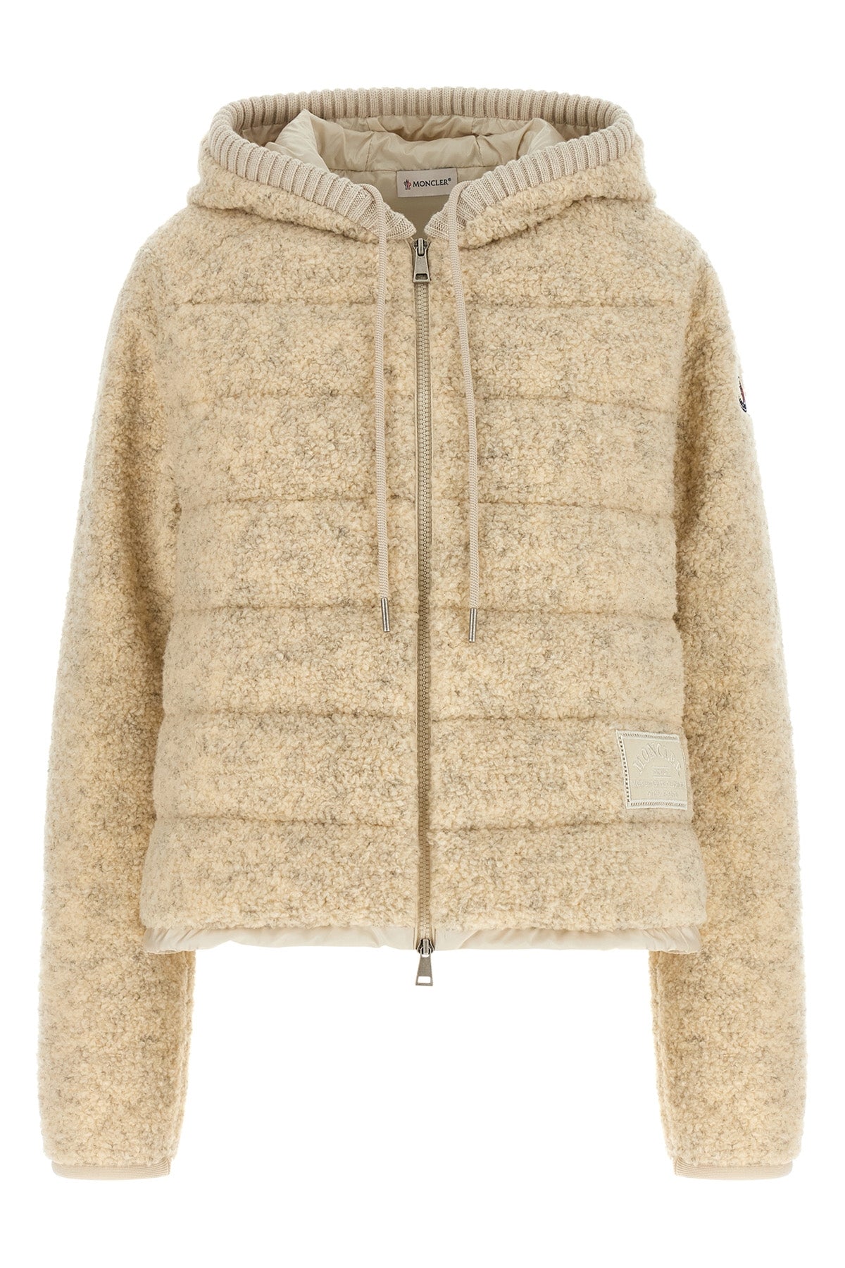 the moncler sweatshirt stands out for its hybrid construction that combines knit