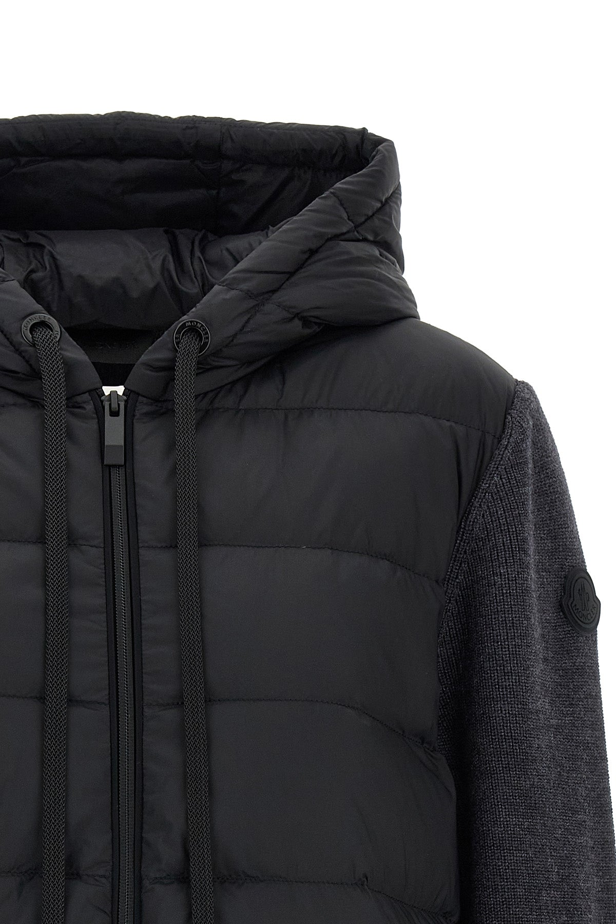the moncler cardigan exemplifies an advanced hybrid construction