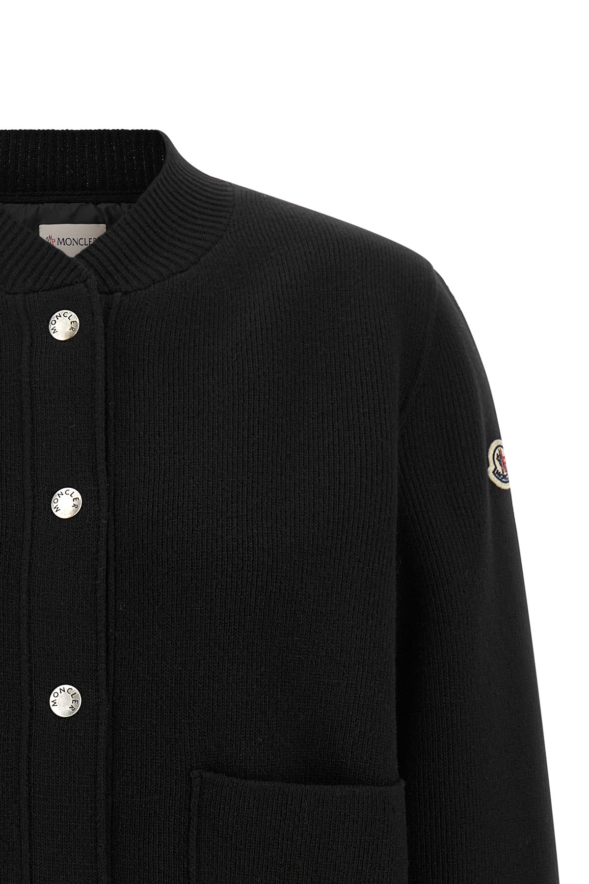 the moncler cardigan redefines the concept of transitional outerwear through a m
