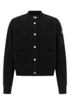 the moncler cardigan redefines the concept of transitional outerwear through a m