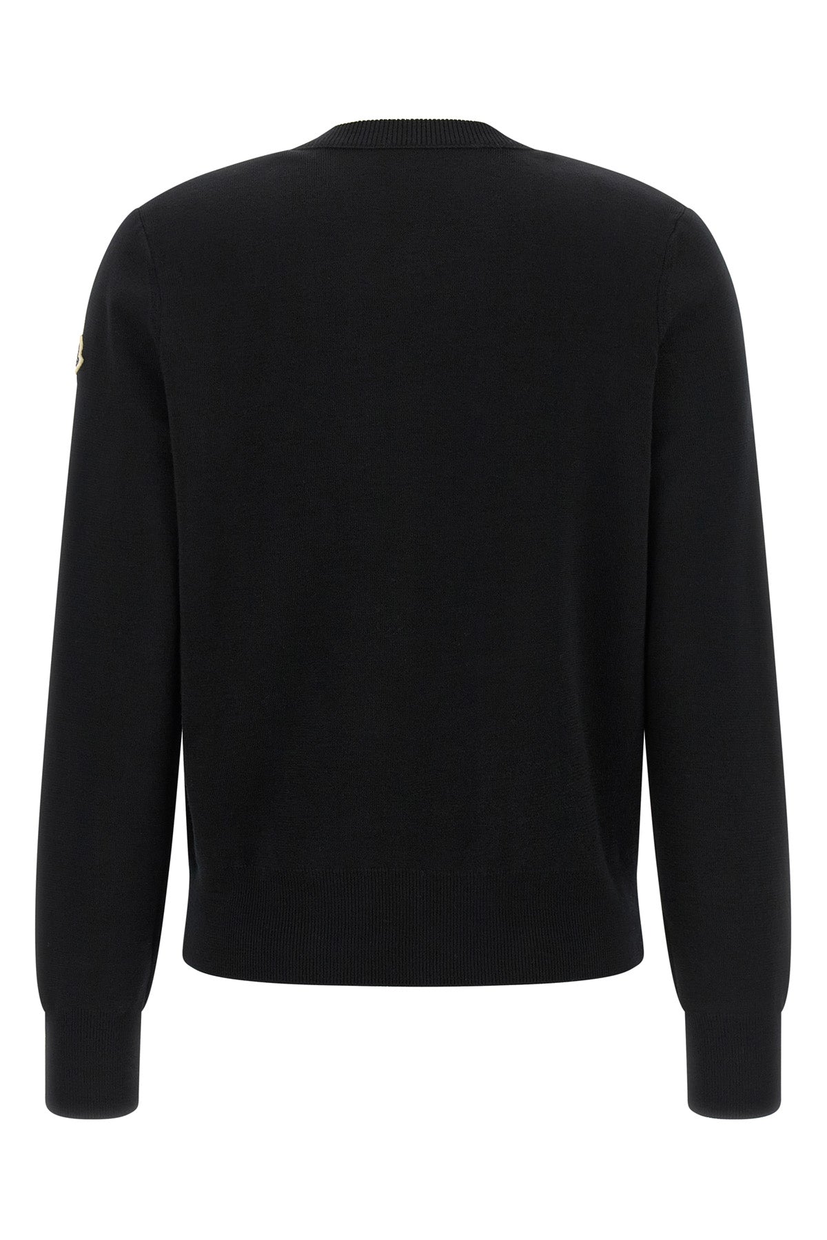 the moncler cardigan in black nuance redefines the concept of hybrid garment thr