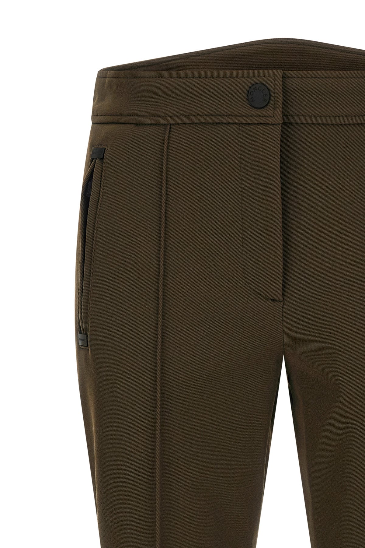 the moncler grenoble trousers redefine alpine clothing through a tight silhouett