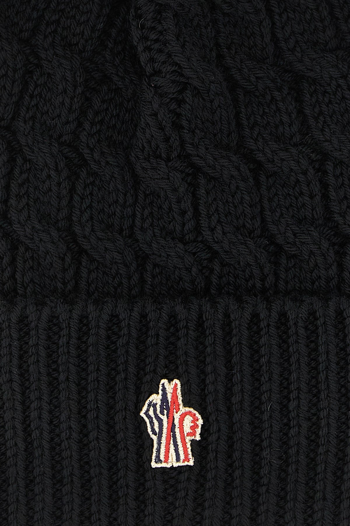 the moncler grenoble cap defines alpine clothing
