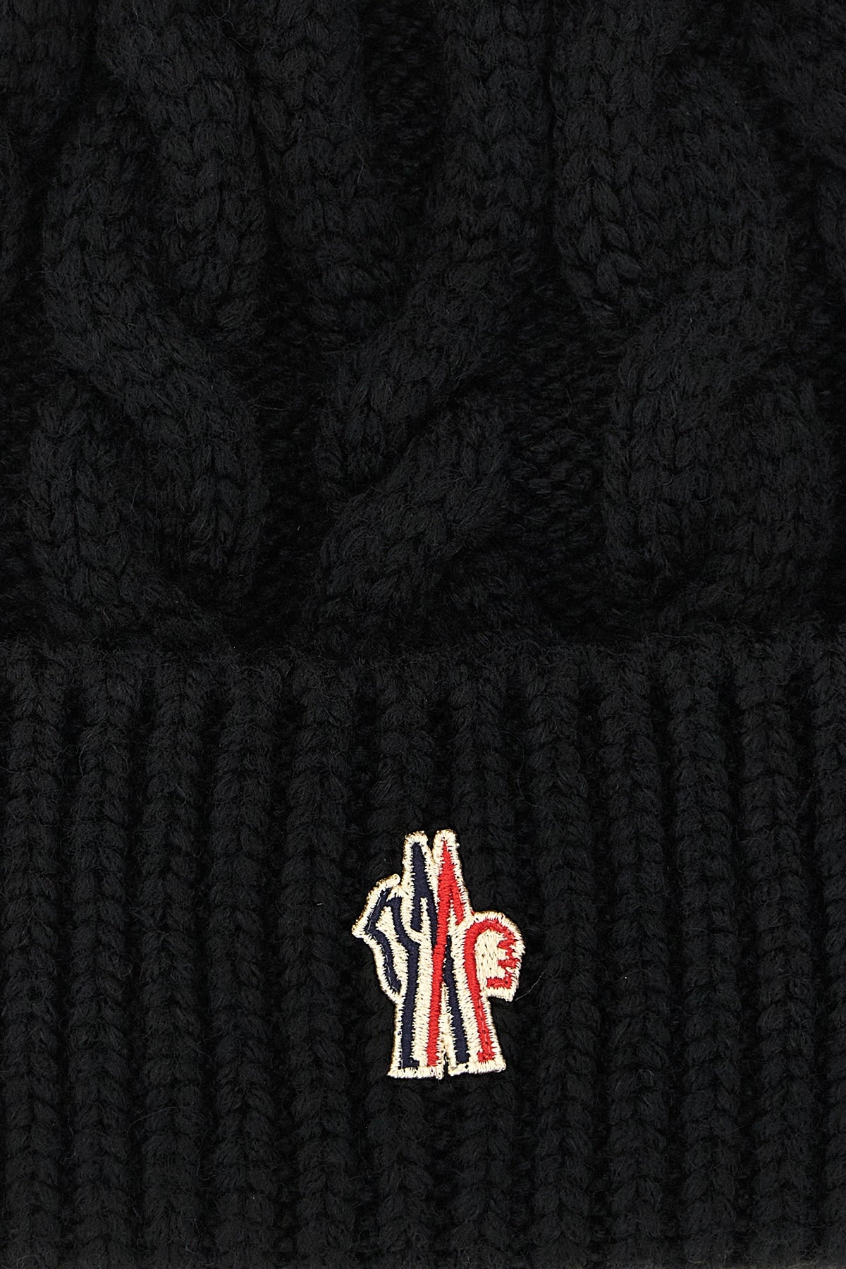the moncler grenoble virgin wool blend cap embodies the excellence of alpine clo