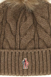 the moncler grenoble cap defines winter clothing through technical construction