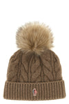 the moncler grenoble cap defines winter clothing through technical construction