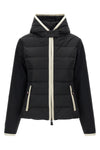 the moncler grenoble con cappuccio e zip cardigan stands out for its hybrid co