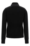 the moncler grenoble cardigan stands out for its hybrid construction that combin