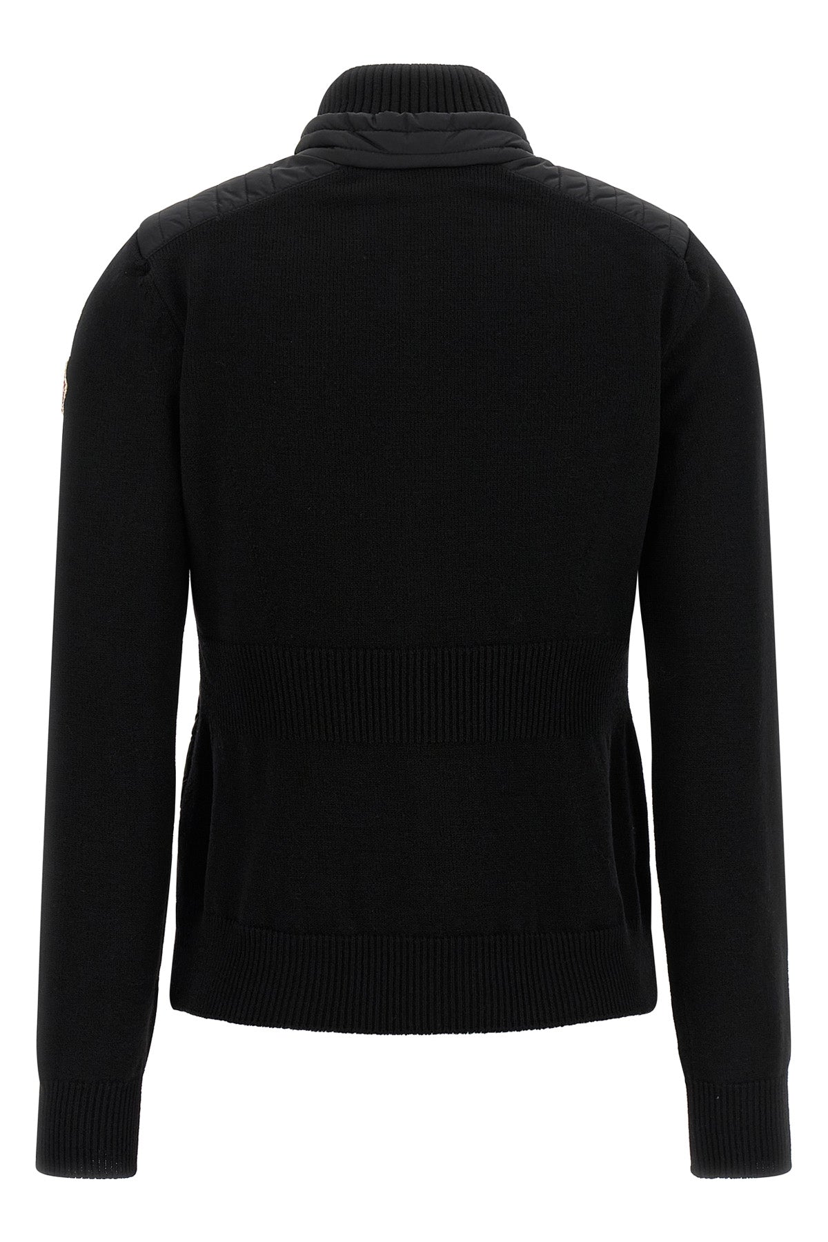 the moncler grenoble cardigan stands out for its hybrid construction that combin