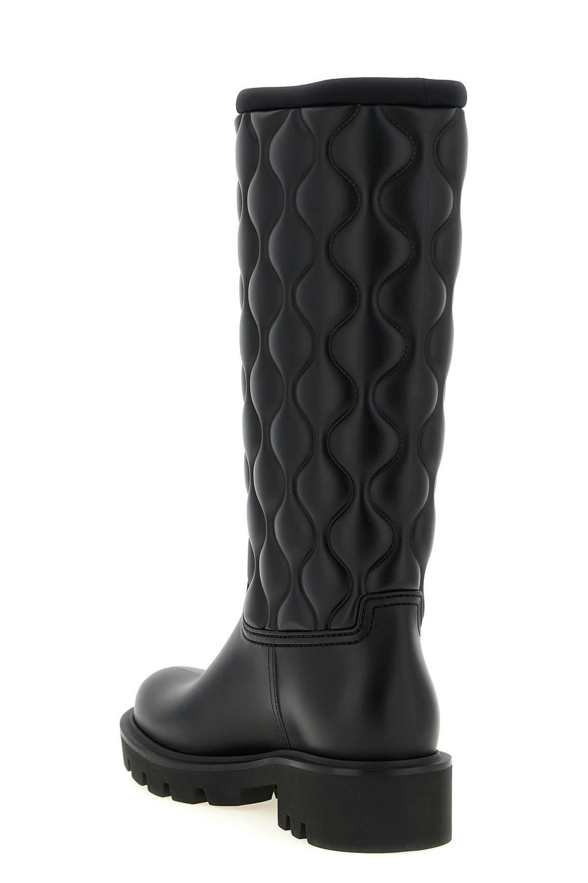 moncler kickstream high boots redefine functional outerwear through a rigorous a