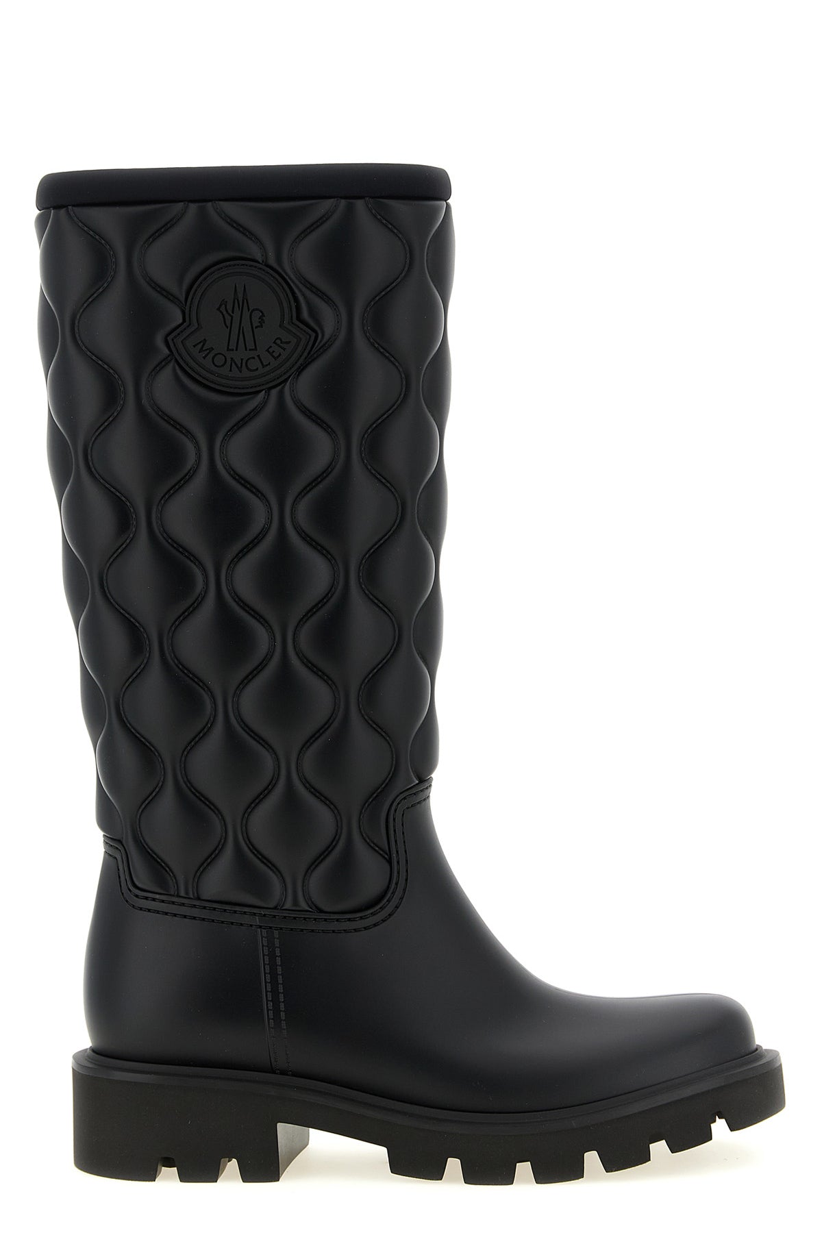 moncler kickstream high boots redefine functional outerwear through a rigorous a