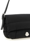 the moncler caradoc shoulder bag translates the brands iconic aesthetic into