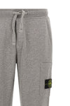 the stone island 6200010 sweatpants in a garment-washed mélange mélange cotton