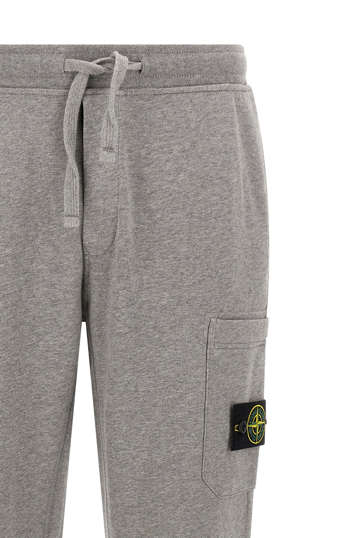 the stone island 6200010 sweatpants in a garment-washed mélange mélange cotton