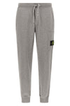 the stone island 6200010 sweatpants in a garment-washed mélange mélange cotton
