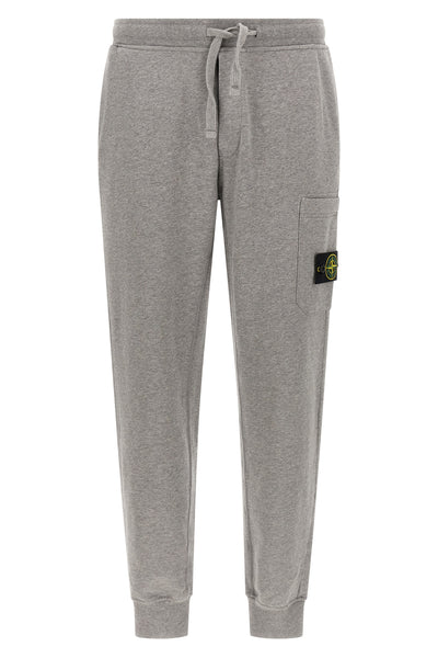 the stone island 6200010 sweatpants in a garment-washed mélange mélange cotton
