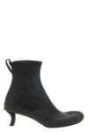 the dive loewe ankle boots redefines the codes of contemporary elegance throug
