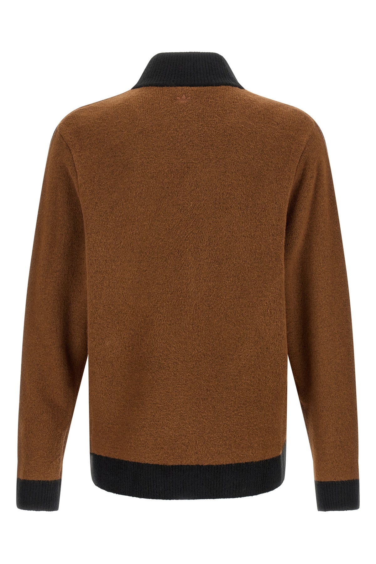 the cardigan born from the collaboration between adidas statement and song for t