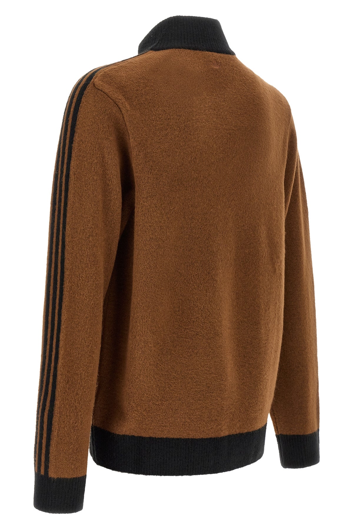 the cardigan born from the collaboration between adidas statement and song for t