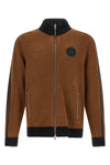 the cardigan born from the collaboration between adidas statement and song for t