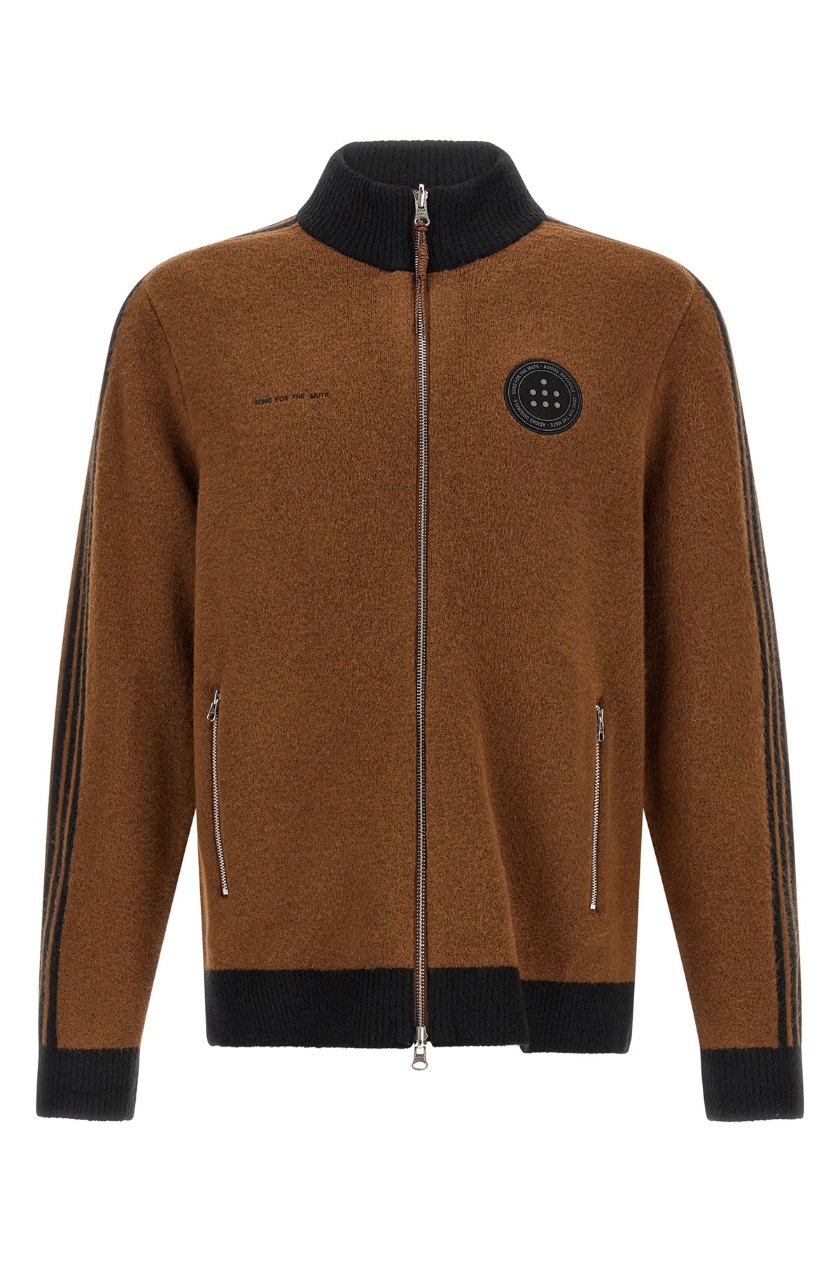 the cardigan born from the collaboration between adidas statement and song for t
