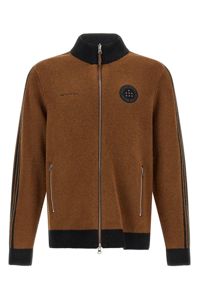 the cardigan born from the collaboration between adidas statement and song for t