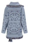 the alanui cardigan redefines knitwear through a complex expression of craftsman