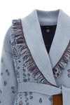 the alanui cardigan redefines knitwear through a complex expression of craftsman